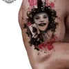 tatouage ephemere bras joker photo Tatouage éphémère bras joker
