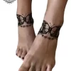 tatouage ephemere cheville papillon photo Tatouage éphémère cheville papillon