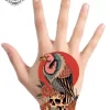 tatouage ephemere main oiseau photo Tatouage éphémère main oiseau