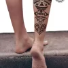 tatouage ephemere mollet maorie photo Tatouage éphémère mollet maorie