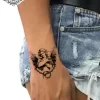 tatouage ephemere poignet ange photo Tatouage éphémère poignet ange