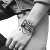 tatouage ephemere poignet king queen photo Tatouage éphémère poignet King queen