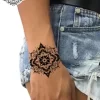 tatouage ephemere poignet mandala femme photo Tatouage éphémère poignet mandala femme