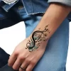 tatouage ephemere poignet note de musique photo Tatouage éphémère poignet note de musique